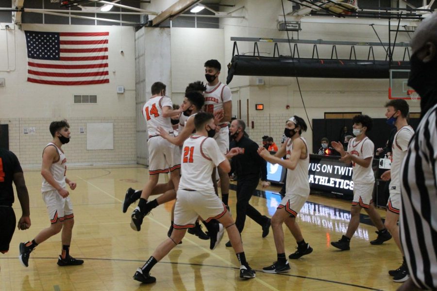 Photo by Mohamad Ghader

The team celebrates as they get a much needed win that would help they get a better seed for the playoffs.