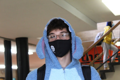 Junior Adam Fakhoury stands in a DHS hallway on Oct. 6, 2021. Fakhoury is dressed as a character named “Stitch” for DHS’ Pajama Day during spirit week.