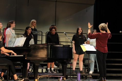 DHS womens ensemble teacher Jennifer Pegouske instructs her class to practise vocal exercises on May 11, 2023